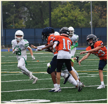 A football player is kicking a football on a field. Description generated by AI