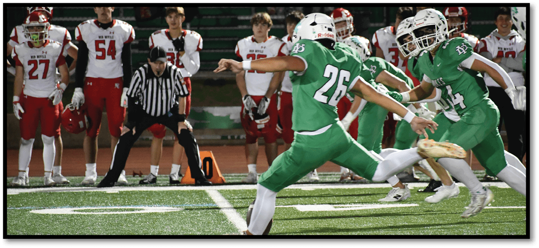 A football player running on the field. Description generated by AI