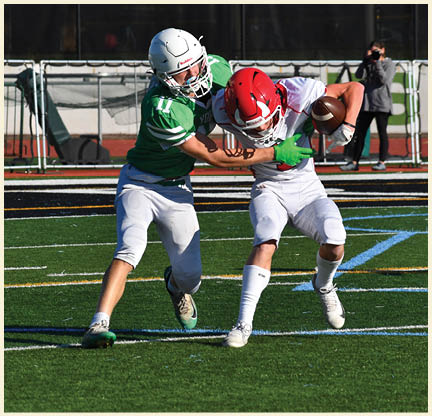 A football player is kicking a football on a field. Description generated by AI