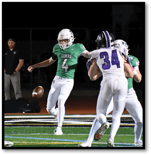 Two football players wearing black jerseys with the number 11 on them. Description generated by AI