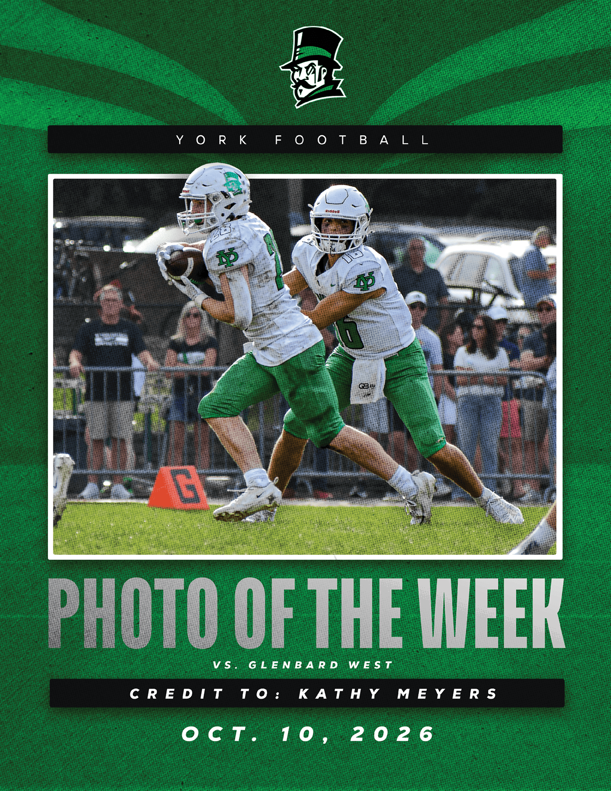 A football player in a green jersey is jumping in the air. Description generated by AI