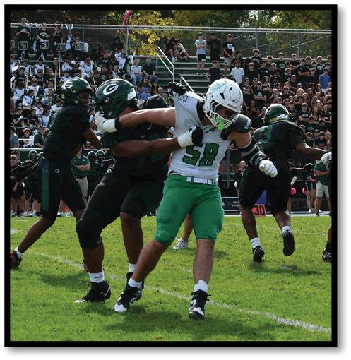 A group of men wearing black and white jerseys. Description generated by AI