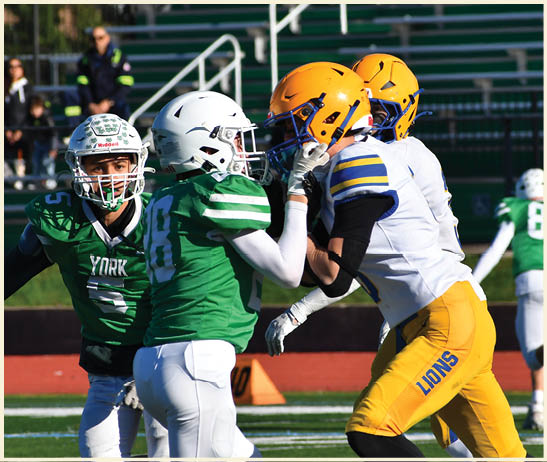 A football player is kicking a football on a field. Description generated by AI