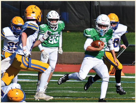 A football player is kicking a football on a field. Description generated by AI