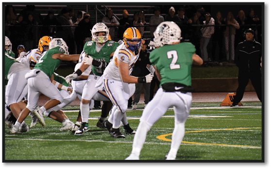 A group of football players wearing black jerseys with the number 3 on them. Description generated by AI