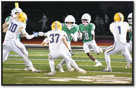 A group of football players wearing black jerseys with the number 3 on them. Description generated by AI