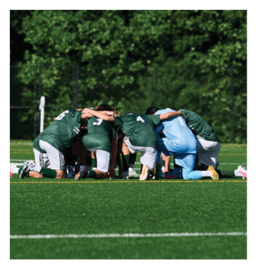 Two men wearing football helmets are talking to each other. AI generated content