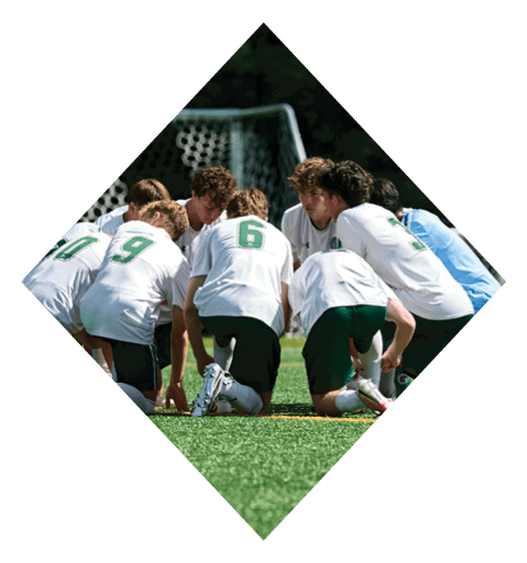 A female football player is kicking a football on a field. AI generated content