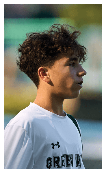 A young man wearing a football jersey with the name Vista on the back. AI generated content