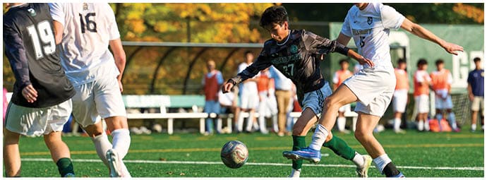 A football player wearing a blue and white uniform. Description generated by AI