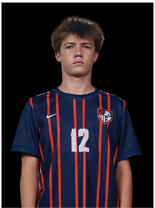 A young man wearing a white and black jersey with the number 14 on it. Description generated by AI