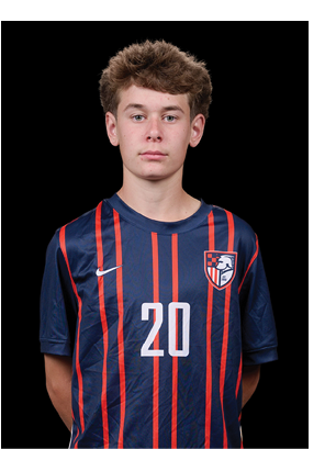 A young man wearing a white and black jersey with the number 14 on it. Description generated by AI