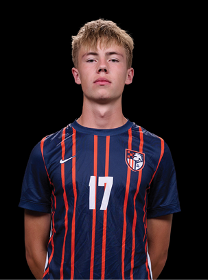A young man wearing a white and black jersey with the number 14 on it. Description generated by AI