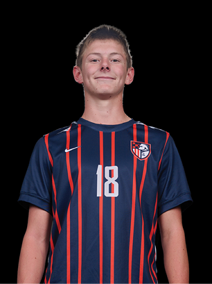 A young man wearing a white and black jersey with the number 14 on it. Description generated by AI