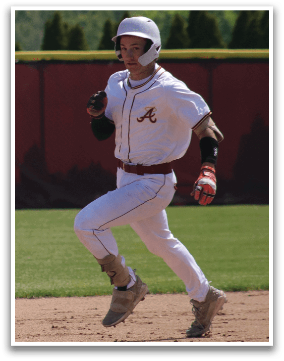 A baseball player running on the field. Description generated by AI