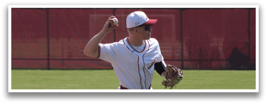 A baseball player in a white and red uniform is throwing a ball. Description generated by AI