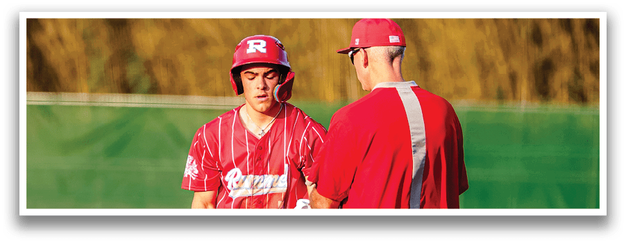 Two baseball players on a field. Description generated by AI