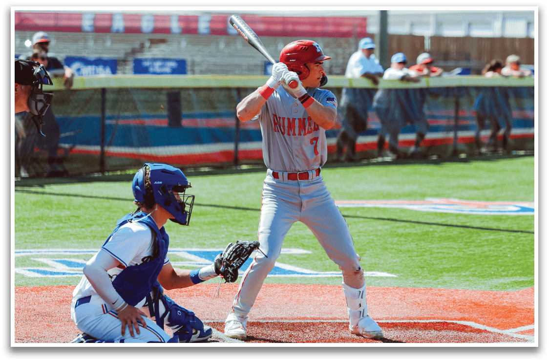 A baseball player is at bat, holding a bat and preparing to swing. The catcher is positioned behind him, wearing a baseball glove. The scene takes place on a baseball field, with a crowd of people watching the game. AI generated content