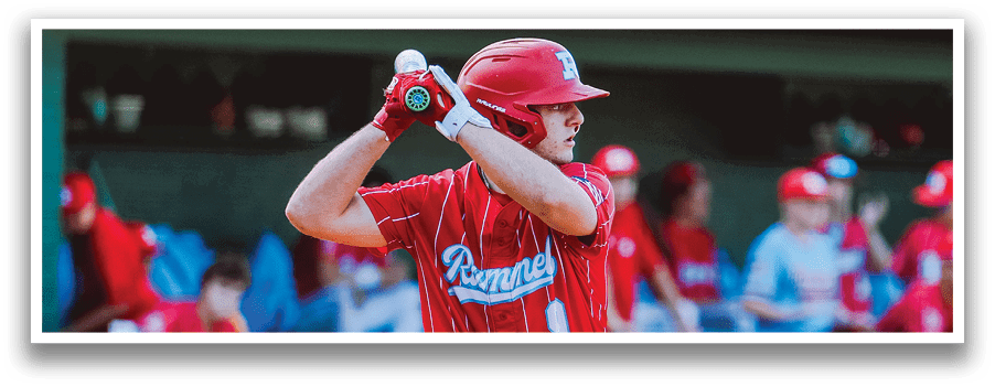 A baseball player is at bat, holding a bat and getting ready to swing. AI generated content