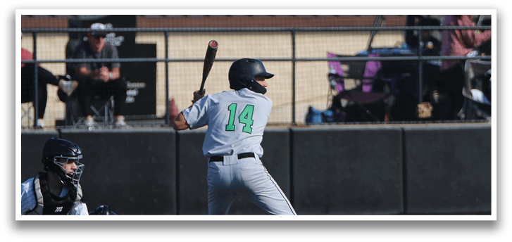 A baseball player in a grey uniform is swinging a bat at a ball. AI generated content