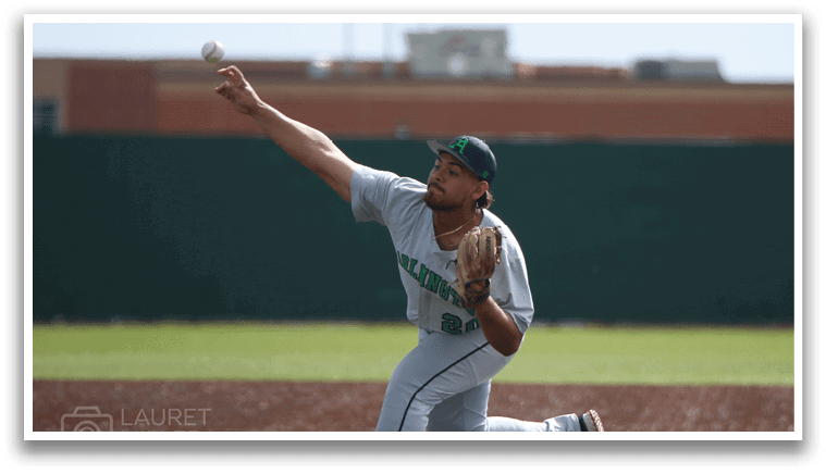 A baseball player in a white uniform is pitching a ball on a field. AI generated content