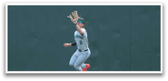 A baseball player in a grey uniform is running on the field, trying to catch a ball. AI generated content