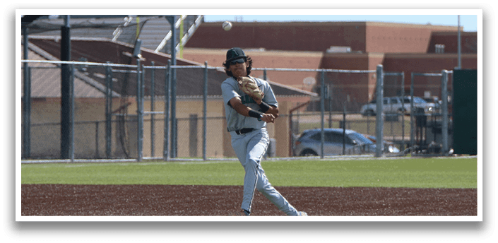 A baseball player in a grey uniform is throwing a ball on a field. AI generated content
