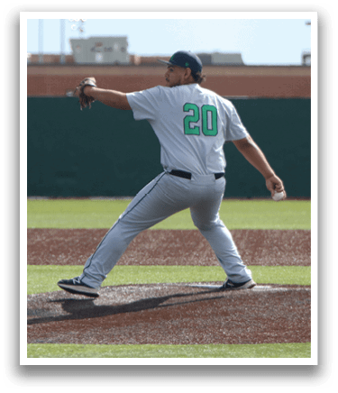 A baseball player in a white uniform is pitching a ball on a field. AI generated content