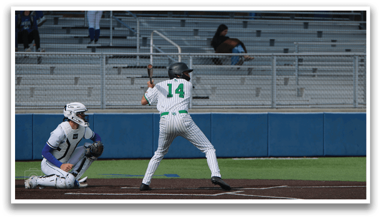 A baseball player in a green and white uniform is swinging a bat, while a catcher and an umpire watch from behind him. AI generated content