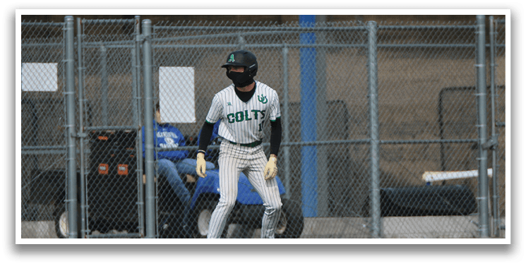 A baseball player wearing a helmet and glove is standing on the field. AI generated content