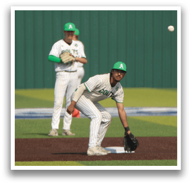 Three baseball players on a field, one of them is catching a ball. AI generated content