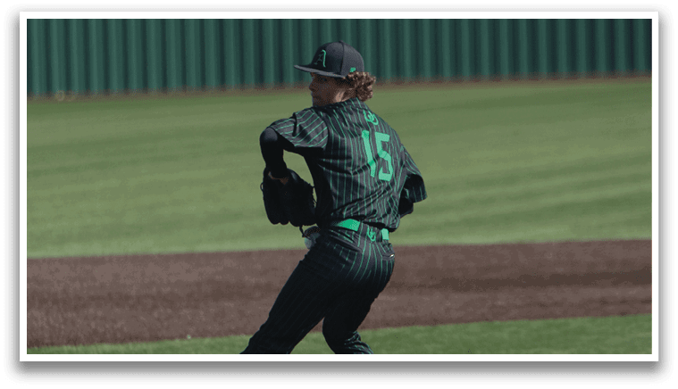 A baseball player in a green and black uniform is pitching a ball on a field. AI generated content