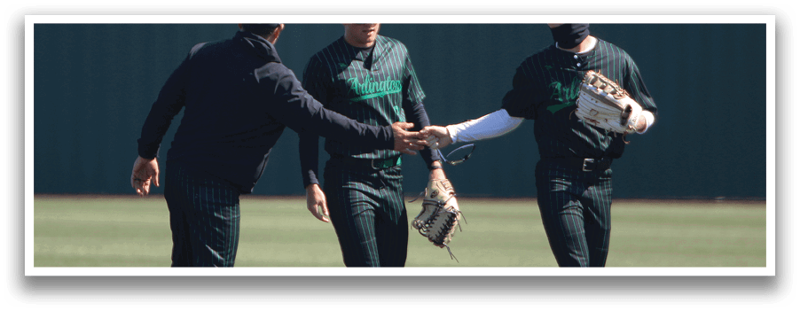 Three baseball players are on the field, shaking hands and congratulating each other. AI generated content
