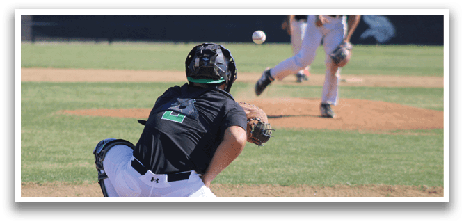 A baseball player in a black shirt and white pants is catching a ball. AI generated content