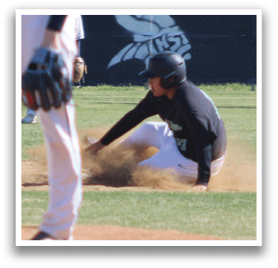 A baseball game is taking place with a player sliding into home plate. AI generated content