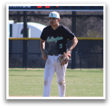 A baseball player wearing a black shirt and white pants stands on the field with a baseball glove. AI generated content