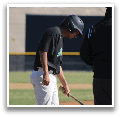 A baseball player with a bat in his hand is standing on the field. AI generated content