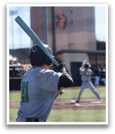 Baseball player with bat, number 21, ready to swing. AI generated content