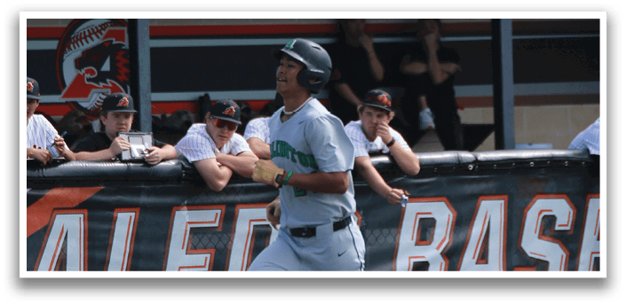 A baseball player in a grey uniform is running on the field. AI generated content