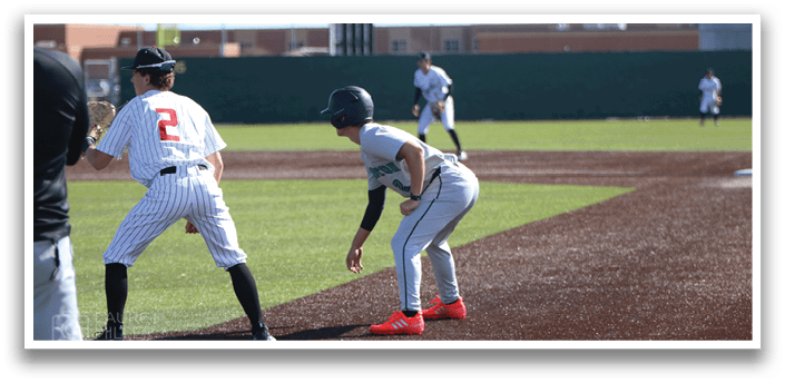 A baseball game is in progress with a player in a grey uniform holding a baseball bat, ready to swing. AI generated content