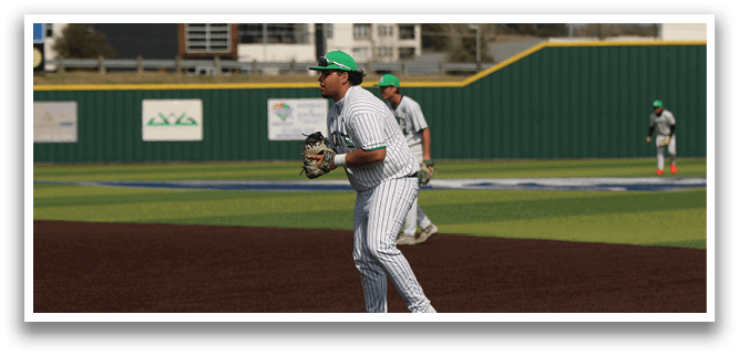 A baseball player in a white uniform is standing on the field, holding a baseball glove. AI generated content