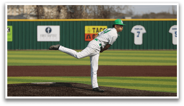 A baseball player in a white uniform is pitching a ball on a field. AI generated content