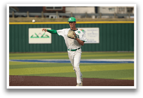 A baseball player in a green and white uniform is throwing a ball. AI generated content