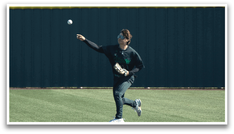 A person is playing baseball, throwing a ball on a field. AI generated content