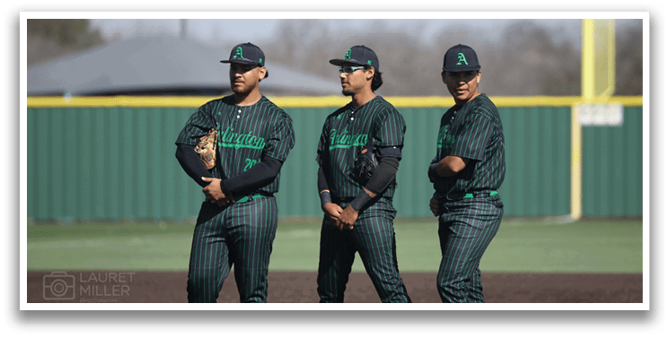 Three baseball players wearing green and black uniforms stand on a field. AI generated content