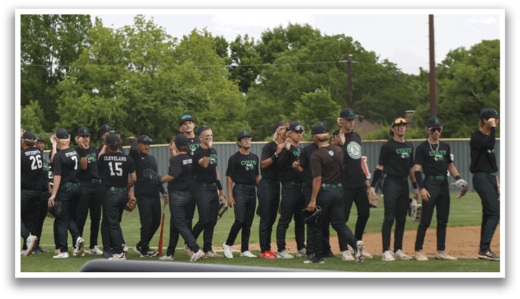 A group of baseball players in black and green uniforms. Description generated by AI