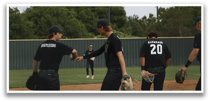 A baseball game is taking place with a group of people on the field. Description generated by AI