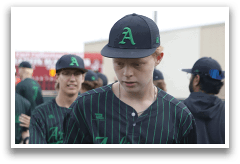 A baseball player wearing a green and black striped shirt. Description generated by AI