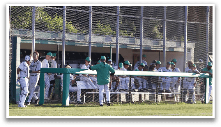 A boy in a blue shirt and shorts is throwing a baseball. Description generated by AI