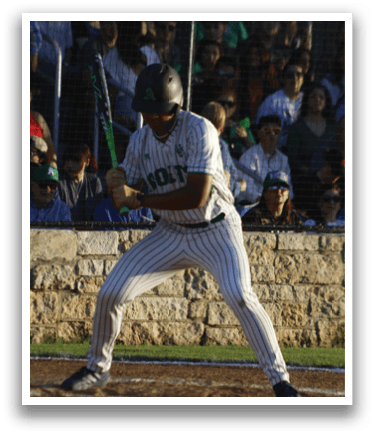 A baseball player catching a ball. Description generated by AI